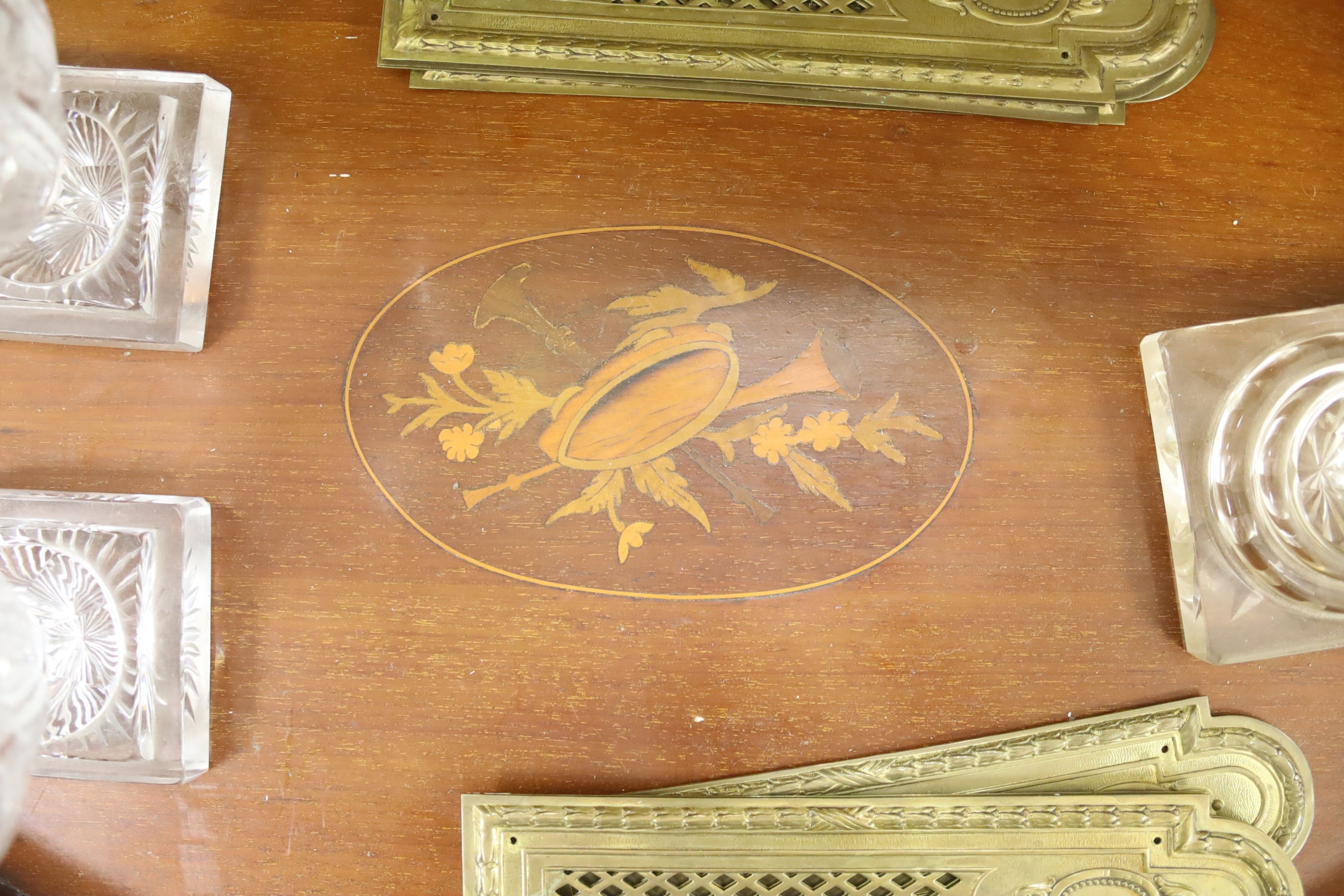 A Victorian walnut stationary cabinet, an Edwardian inlaid oval tray and a group 7 brass fingerplates